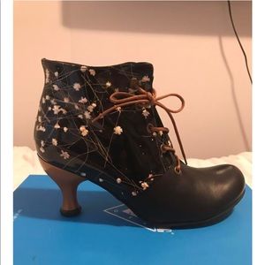 Brand New, never before worn John Fluevog shoes.